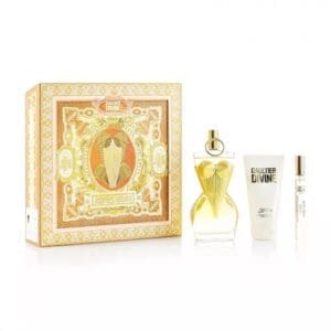 Jean Paul Gaultier Divine perfume gift set with a decorative gold-and-pink box, the Divine fragrance bottle, and matching body products displayed.